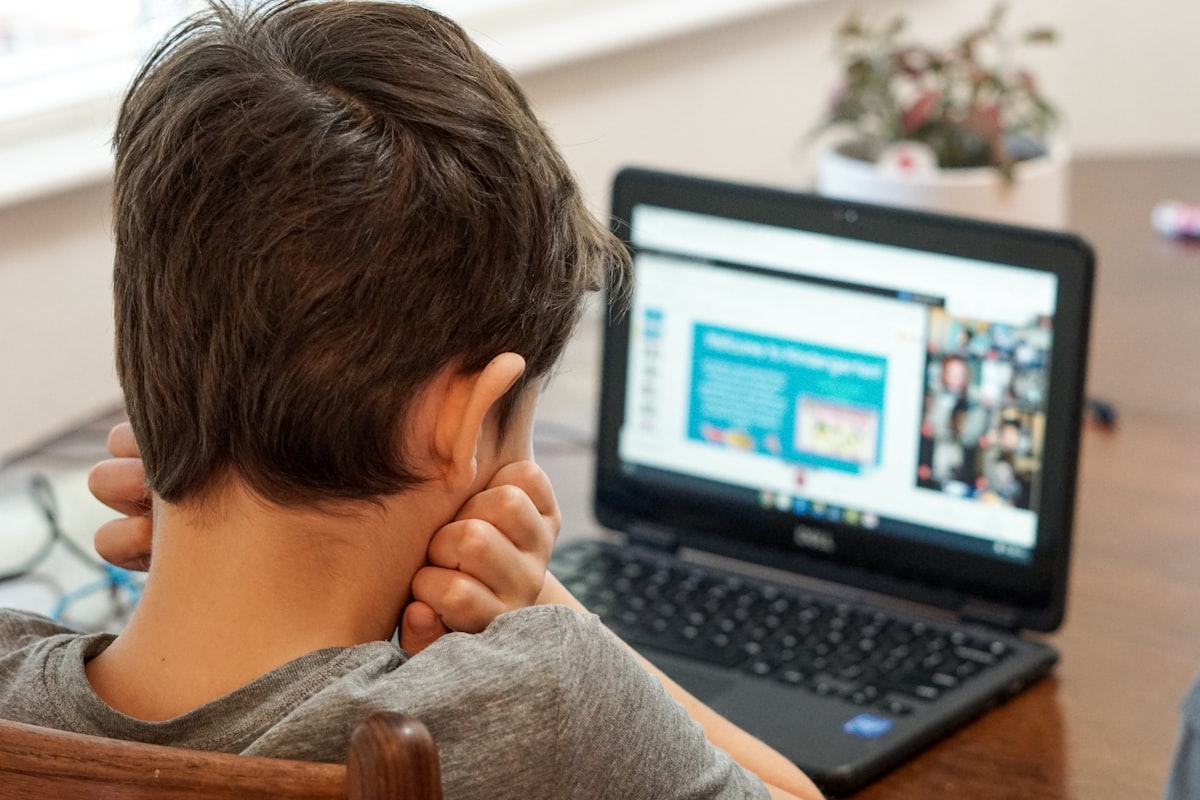 Child engaged in an online Quran lesson